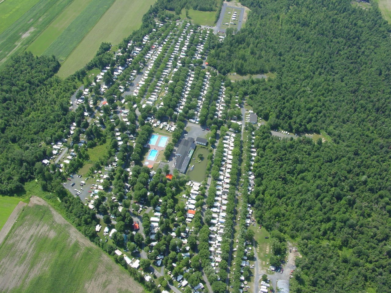 Aerial view of the seasonal sites at Camping Mon Repos